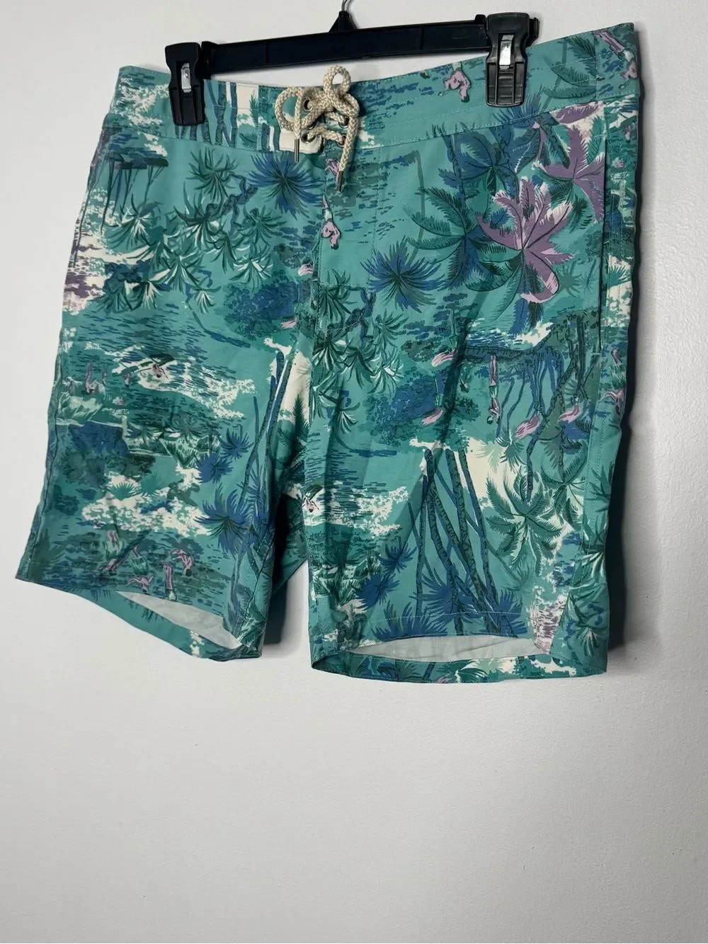 Faherty board shorts featuring a tropical print size 32